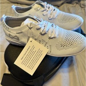 Brand new cheerleading sneakers with case!